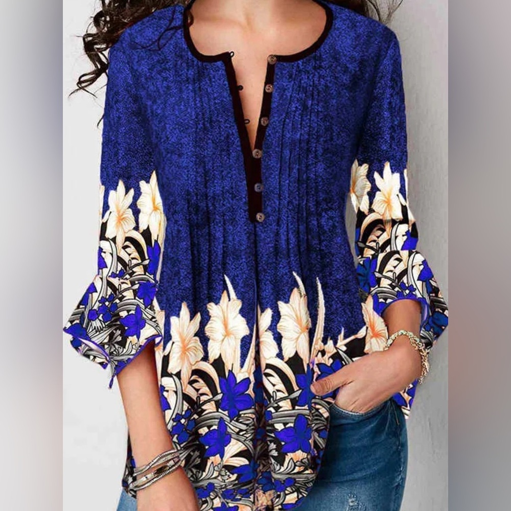 NO BRAND SHOWN size LARGE blue with floral designed 3/4 length sleeves blouse.